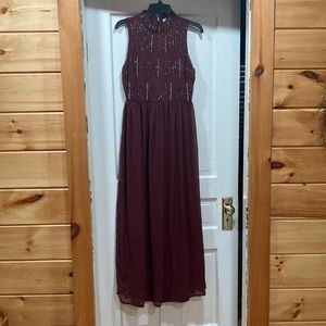 Sequin burgundy special occasion dress.